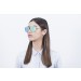 shiny gold metal frame with green revo flat lens